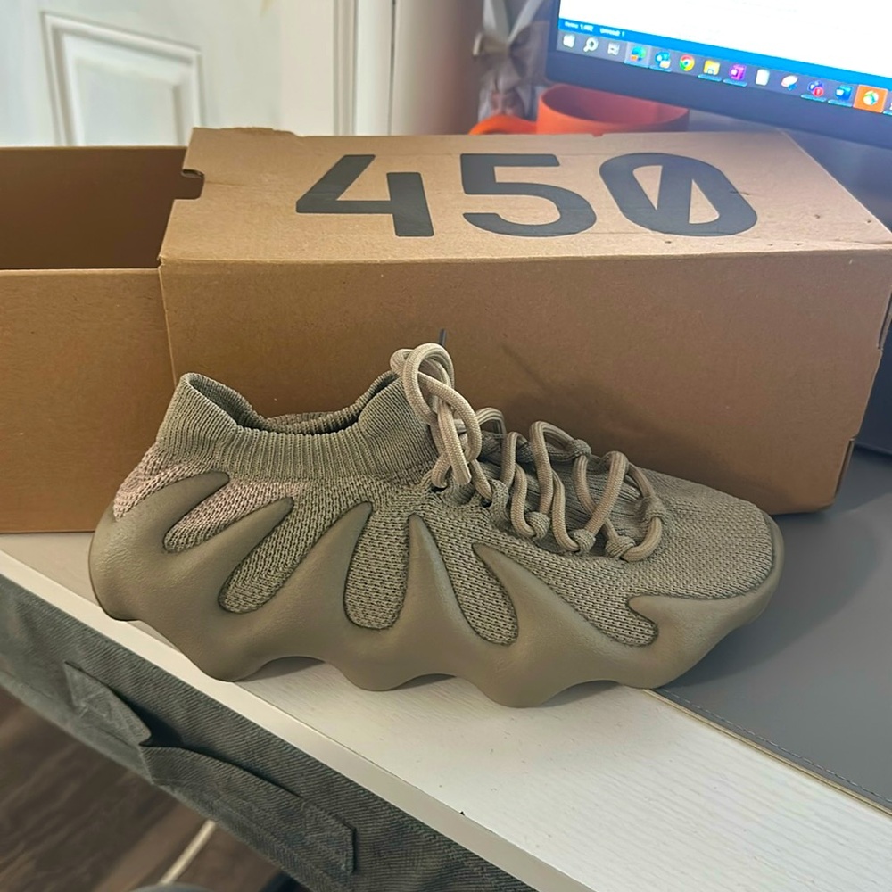 New, tried on. Originally box.